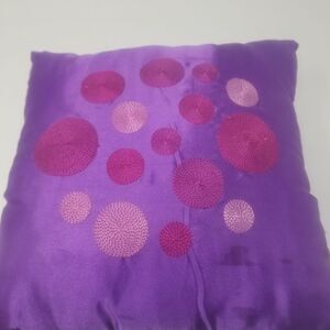 Purple throw pillow